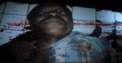 Le corps du magistrat, Modeste Bria, entaché de sang.