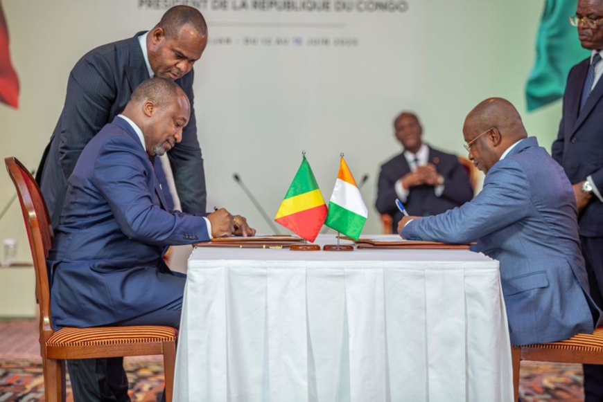 Signature d'accords entre le gouvernement congolais et ivoirien. Signature d'accords entre le gouvernement congolais et ivoirien.