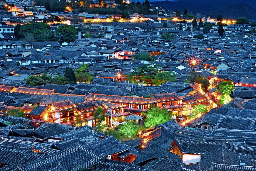 Photo shows an aerial view of Lijiang ancient town. (Photo/Tang Xinrong) Photo shows an aerial view of Lijiang ancient town. (Photo/Tang Xinrong)