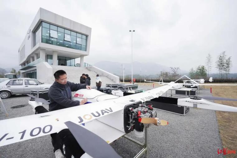A staff member checks a drone at the Chinese national civil unmanned aerial vehicle (UAV) testing base "Sky Eye" in Pengzhou, southwest China's Sichuan province. (Photos courtesy of Red Star News)