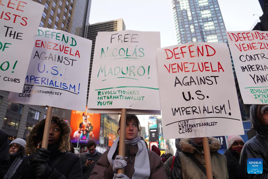 People take part in a protest against U.S. attacks on Venezuela in New York city, the United States, on Jan. 3, 2026. The U.S. military launched a series of attacks against Venezuela early Saturday morning, reportedly capturing Venezuelan President Nicolas Maduro and flying him out of the country. (Xinhua/Zhang Fengguo)