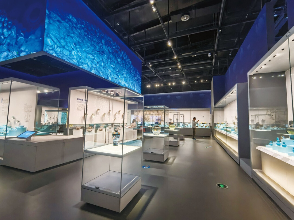 Photo shows the exhibition hall of Deep Blue Marvels, featuring selected artifacts recovered from the No. 1 and No. 2 shipwrecks discovered on the northwestern slope of the South China Sea at the China (Hainan) Museum of the South China Sea in Qionghai, south China's Hainan province. (Photo provided by the State Administration of Cultural Heritage of China)