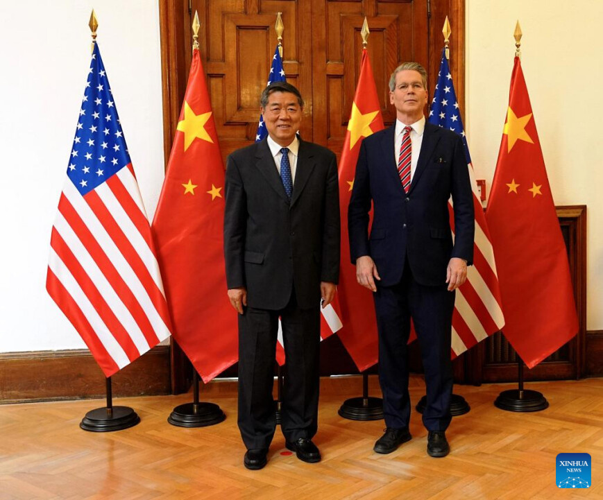 Chinese Vice Premier He Lifeng, also a member of the Political Bureau of the Communist Party of China Central Committee, poses for a photo with U.S. Treasury Secretary Scott Bessent prior to their talks in Madrid, Spain, Sept. 14, 2025. The Chinese and U.S. delegations convened here on Sunday for talks on economic and trade issues. (Xinhua/Xing Guangli)