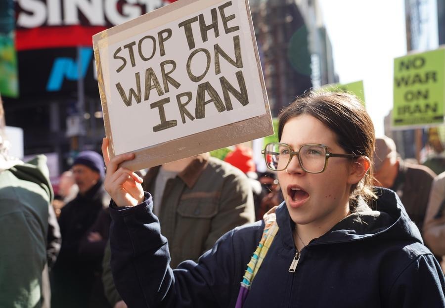 People attend a protest against U.S.-Israeli attacks on Iran, in New York, the United States, on Feb. 28, 2026. (Xinhua/Zhang Fengguo)