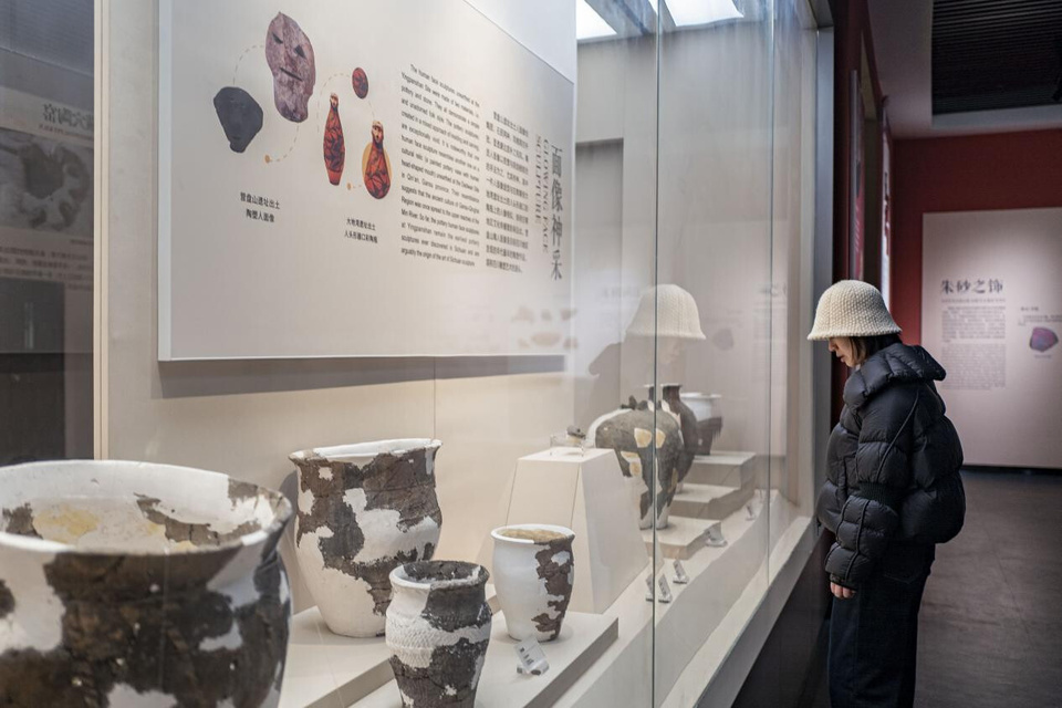 A woman visits the Qiang Museum of Maoxian in Maoxian county, southwest China's Sichuan province. (Photo/Wang Chu)