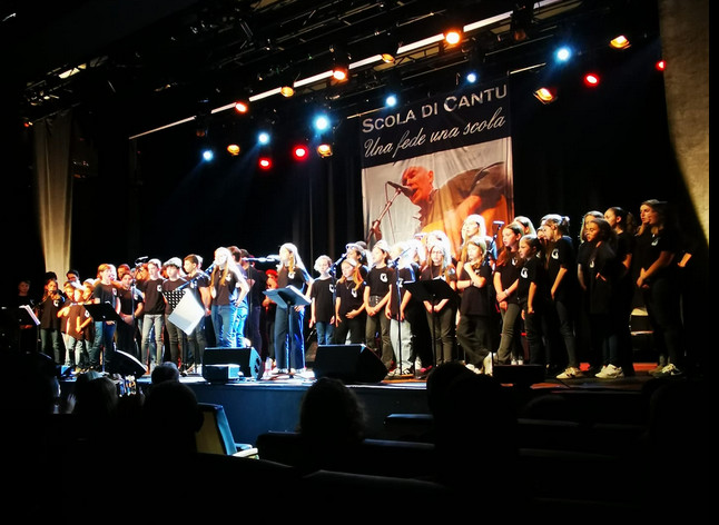 "A scola di cantu di Natale Luciani" pà a festa di a lingua corsa in Aiacciu