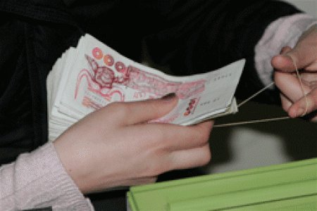 Billets de mille dinars. PH/DR