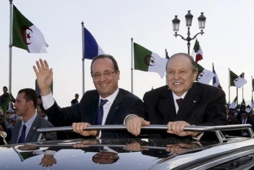 Alger, le 19 décembre: François Hollande avec Bouteflika qui a mis en oeuvre la politique criminelle d'amnistie pour les terroristes islamistes. (PH/DR)