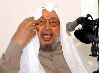 Al Qardaoui, chef spirituel international des organisations islamo-terroristes que la Bachaghas Khalida Toumi a ramené pour une conférence à Tizi-Ouzou, en 2007,  à la maison de la culture Mouloud Mammeri, par l’intermédiaire de son complice, l’autre Bachaghas, Ould Ali-Lhadi.
