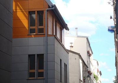 (c) MdlM - Pour respecter les normes normes accoustiques, l'épaisseur du plancher est supérieure à celle d'une construction en béton